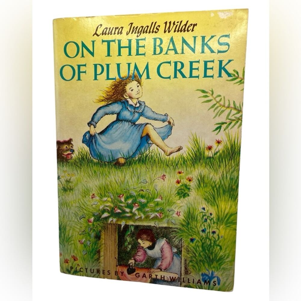 On the Banks of Plum Creek by Laura Ingalls Wilder Paperback